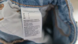 American Eagle Outfitters baggy mom short shorts ripped in light wash blue size 4. thumbnail 13