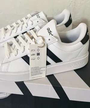 adidas White and Black Women's Athletic Sneakers thumbnail 1