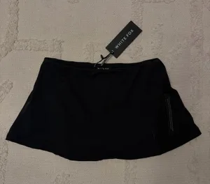 White Fox Skirt Boutique thumbnail 1