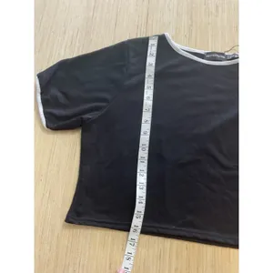 PrettyLittleThing crop top US size 16 black body-contrasting white trim thumbnail 4