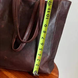 Antonio Valeria is a former Spacious Brown Leather Tote with Minimalist Design thumbnail 7