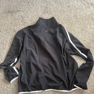 NWT Beyond Yoga Stretch Woven Course Contrast Half Zip Pullover size L black thumbnail 4