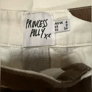 Princess Polly Be Wild Pants White and Brown Cow Print Size 2 thumbnail 6