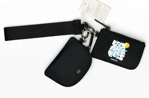 NWT Lululemon Dual Pouch Wristlet Los Angeles Black LW9FMGS‎ Ipod Change Case thumbnail 1