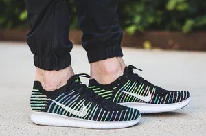 Nike Flyknit Tennis Shoes Black And Rainbow thumbnail 1