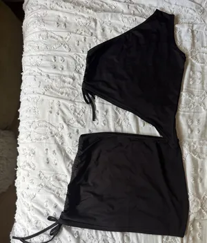 CSDAJIO 2 Piece Outfit One Shoulder Asymmetrical Hem Crop Top and Mini Skirt Set thumbnail 1