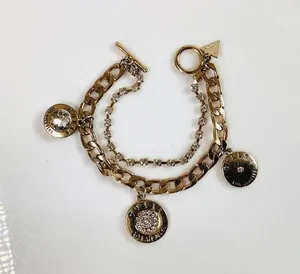 Guess gold Tone Charm Bracelet thumbnail 1