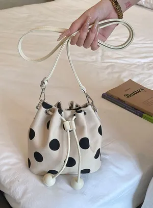 Chic Carryalls Polka Dot Drawstring Bucket Crossbody Bag thumbnail 1