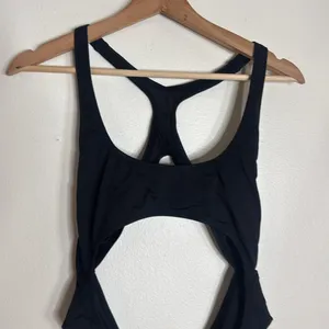 SKIMS Black cutout swimsuit monokini in color onyx size large beach boat resort thumbnail 3