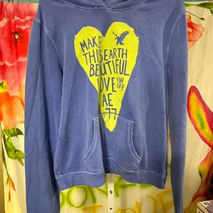 S240. American Eagle blue hoodie with yellow graphic Size M thumbnail 1