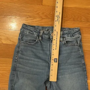 American Eagle outfitters distressed curvy hi-rise jegging size 4 short . thumbnail 6