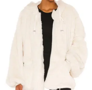 Free People Movement Take a Moment Faux Fur Hooded Jacket in ivory. thumbnail 1