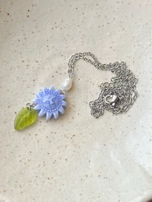 Handmade unique funky cute light blue ceramic sun & Czech glass leaf & freshwater pearl necklace☀️🌿 thumbnail 5