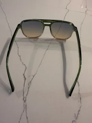 Unbranded Women's Aviator Sunglasses Like New Condition Description: Elevate your accessory collection with these stylish women's aviator-style sunglasses. Featuring translucent green frames and tint-gradient square aviator lenses, these frames offer a chic, modern retro look suitable for any season. Brand: Unbranded Size: One Size Fits Most Condition: Excellent, like-new condition with no scratches, marks, or visible flaws. Includes: Comes with a soft black drawstring protective pouch/case. Carefully packaged and ready to ship promptly! thumbnail 2