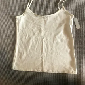 - Old Navy Sleepwear bottoms(black with pink flower print) and top(white) thumbnail 10