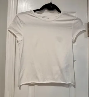 NWOT Anthropologie Size XS White Stretch Short Sleeve Raw Hem Stretch Crop Top thumbnail 1