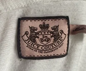 JUICY COUTURE-WHITE ZIP FRONT HOODIE-WOMENS SIZE SMALL Cozy white hooded zip-up jacket with drawstrings. Perfect for casual wear, 3/4 sleeves, gold hardware, J zipper pull, 100% cotton, has stretch, excellent condition Measurements: Bust: armpit to armpit 23-25 inches Length: shoulder seam to bottom 20 inches thumbnail 8