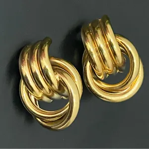 Vintage Gold Tone Grooved Tube Interlocking Knot Modern Chunky Clip On Earrings thumbnail 3