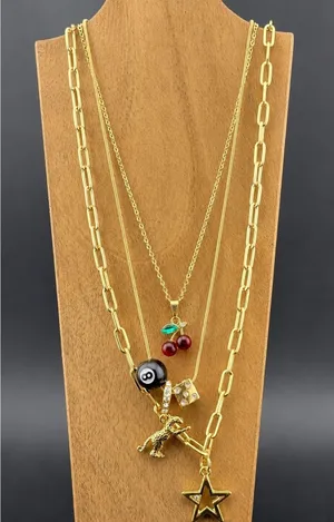 Set of 3 Gold Tone Charm Necklaces with Star, Dinosaur, Dice thumbnail 1