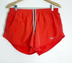 Nike Dri-FIT Tempo Running Shorts Salmon Pink Size L Zip Pocket thumbnail 1