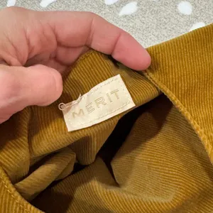 MERIT corduroy tie makeup bag ribbed cosmetics travel pouch caramel neutral thumbnail 10