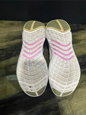 Nike Women's White Athletic Sneakers with Subtle Pink and yellow Accent thumbnail 5