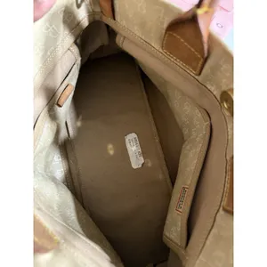 Dooney and Bourke Beige Canvas and Leather Signature Tassel Tote Handbag‎ thumbnail 5