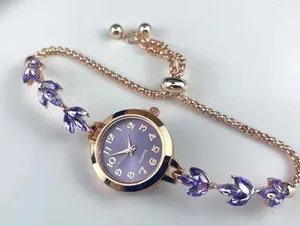 Brand New Purple and gold watch with purple gemstones thumbnail 1