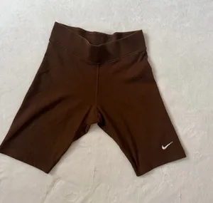 Nike Brown Athletic Bike Shorts with White Swoosh thumbnail 1