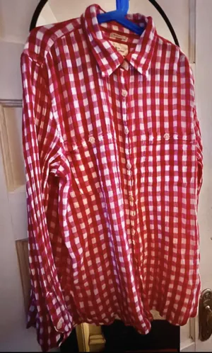 Classic gingham button-down with long sleeves. Chest pockets and button cuffs. Lightweight casual style from Ralph Lauren. thumbnail 1