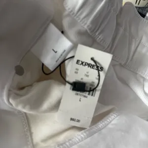 Express Super High Rise white denim skirt thumbnail 4
