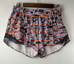 Lululemon Hotty Hot Multi Shorts size 10 tall Black Blue Orange print thumbnail 1