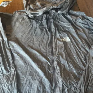 The north face brown woman’s windbreaker 2XL thumbnail 1