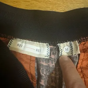 Anthropologie Hei Hei kiri kiti pants orange black medium pull on thumbnail 5