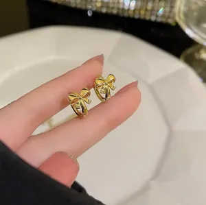 Mini Bow Chunky Gold Hoops thumbnail 1