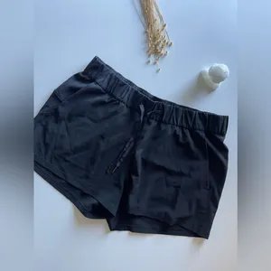 Lululemon On The Fly Woven Short Inseam 2.5" Black Size 12 thumbnail 5