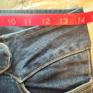 Bebe Vintage Y2K Low Rise boot cut Indigo jeans with belt buckle closure EUC thumbnail 3