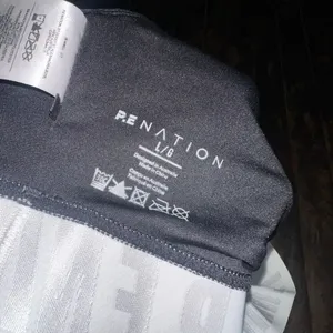 PE Nation black and white strappy Athleisure L sports bra thumbnail 3