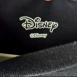 Disney Eore black graphic tee with rain cloud Sz large thumbnail 3