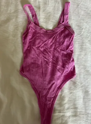 Urban Outfitters Out from under pink bodysuit thumbnail 1