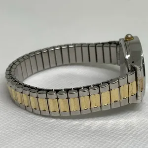 Women’s quartz analog watch gold silver tone 28mm stretch band 6.5” running thumbnail 6