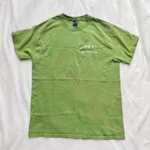 green and white Notre Dame Holy Half Marathon shirt thumbnail 1