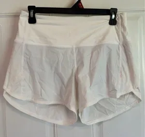 Size 6 Lululemon White High-Rise 4" speed up shorts thumbnail 1