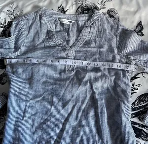 “The Tunic Shirt” from Old Navy in a soft, cool-toned gray thumbnail 5