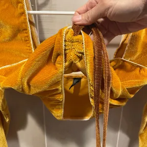 Cute golden ribbed corduroy stretchy cinched tie long sleeve crop top Cider thumbnail 6