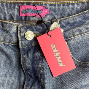 Edikted Gurnge Light Blue Denim Cutoff Shorts with Frayed Hem thumbnail 2