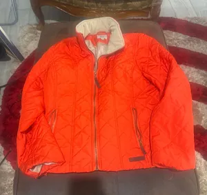 Orange quilted puffer jacket  thumbnail 1