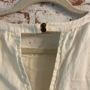 Anthropologie Cream and Gold Embellished Blouse thumbnail 6