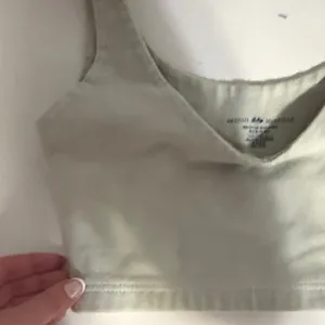 Brandy Melville Soft light green Cream Crop Top thumbnail 3