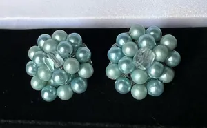 vintage 1950s-1960s cluster clip-on earrings, featuring blue faux pearl thumbnail 1